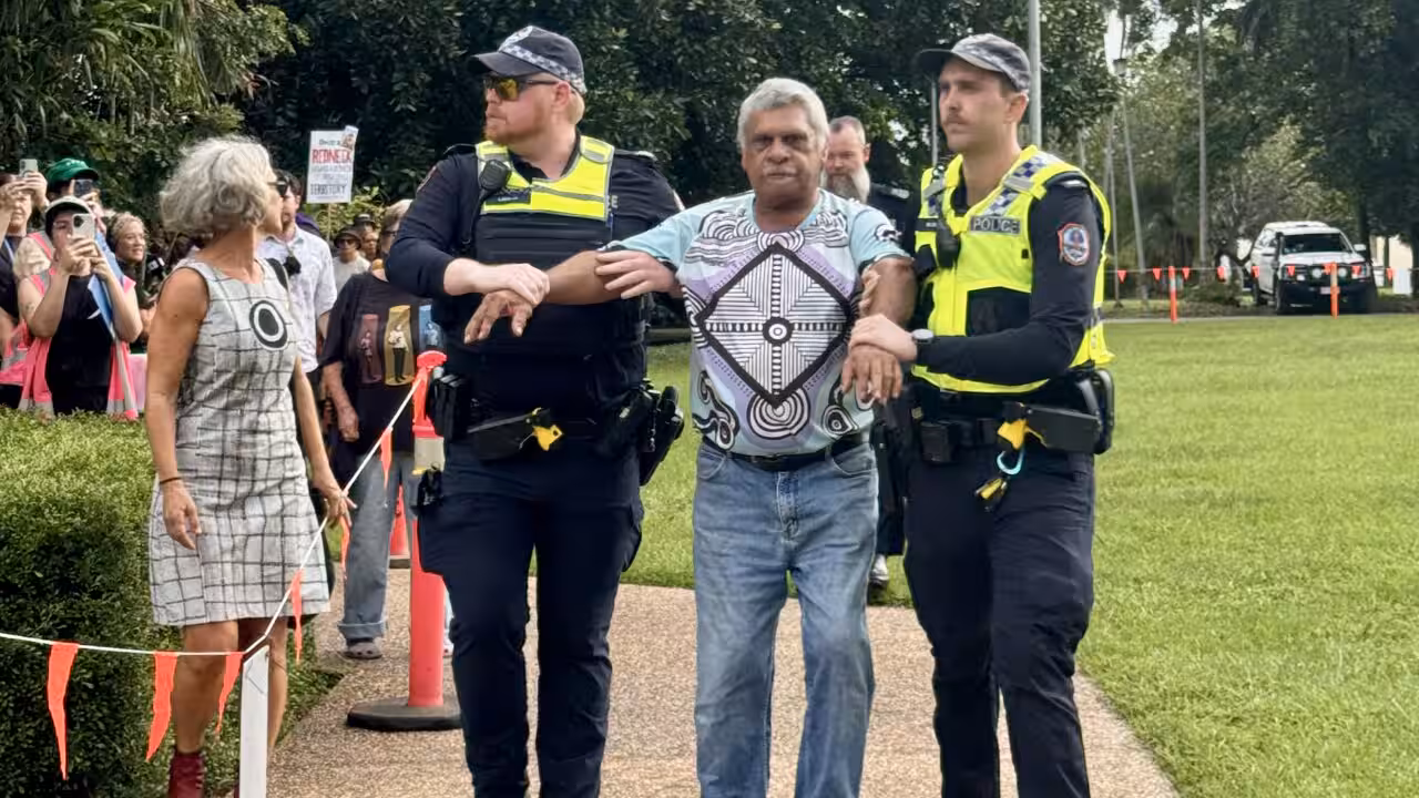 Larrakia Elder arrested amid protests over controversial NT Administrator swearing-in Larrakia Elder arrested amid protests over controversial NT Administrator swearing-in